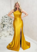 Bridesmaid wearing a modern strapless fitted bridesmaid dress with stretch. The dress has a slit at the leg, and curved architectural detailing at the neck, and is shown in a golden vibrant yellow on a blonde model.