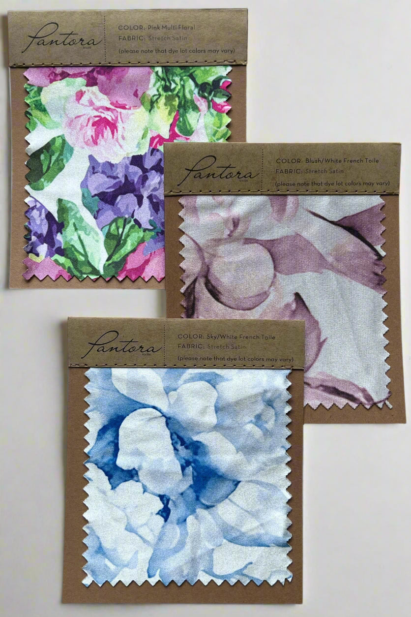 Printed stretch satin swatches in multicolor floral, blush toile and sky toile
