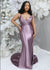 Curvy black bridesmaid wearing a stretchy mermaid bridesmaids dress with deep v-neck and open back. Shown on plus size model.