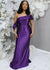 Plus size bridesmaid in asymmetrical fitted stretch satin bridesmaid dress with draping across the neckline continuing to an off-the-shoulder strap. This style is designed to flatter and complement all body types. Shown in jewel tone on a black curvy model.