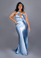 Fitted stretch satin bridesmaid dress with one shoulder detailing, ruching, and keyhole neckline on plus size curvy model