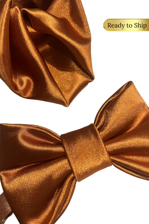 groomsmen matching bow tie and pocket square in terracotta,  matching bridesmaid color