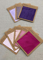 Stretch satin swatch cards in purple, lilac, blush and fuchsia