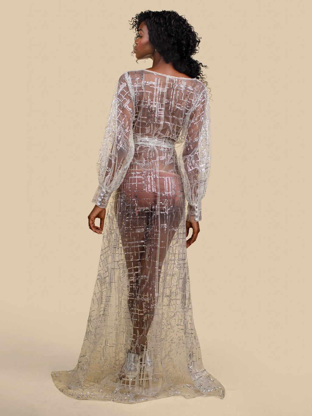 Back view of black female model wearing long sheer glitter sparkle mesh robe with long sleeves and tie waist