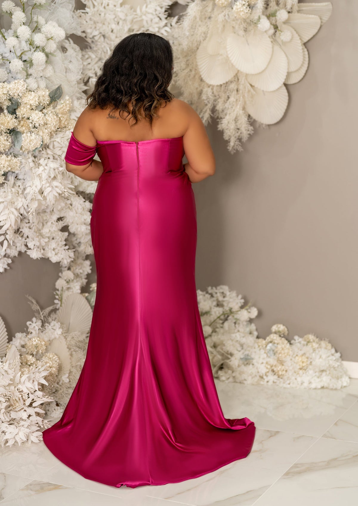 Stretch satin bridesmaid dress with sweetheart neckline and leg slit on plus size curvy black bridesmaid