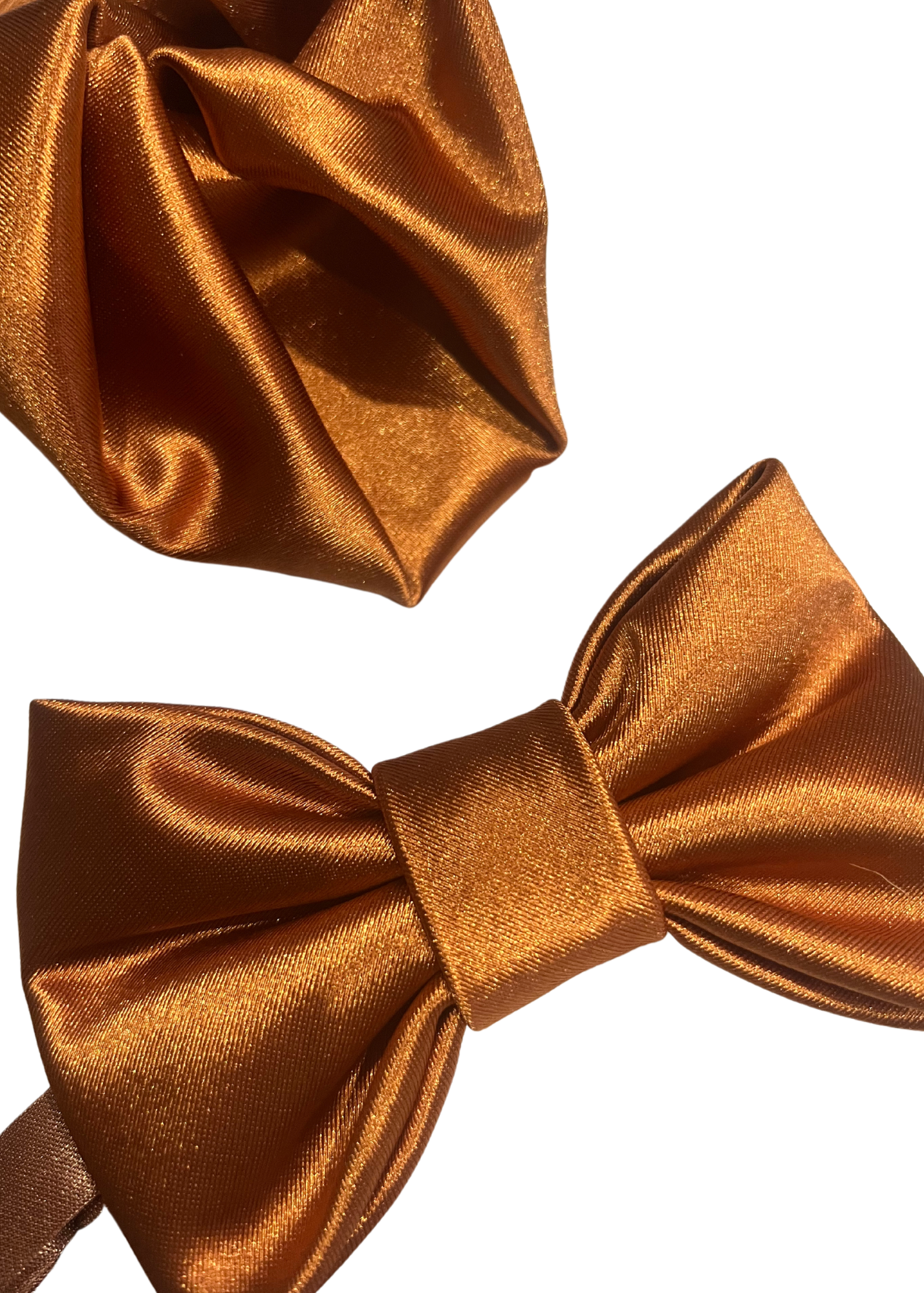 groomsmen matching bow tie and pocket square in terracotta,  matching bridesmaid color